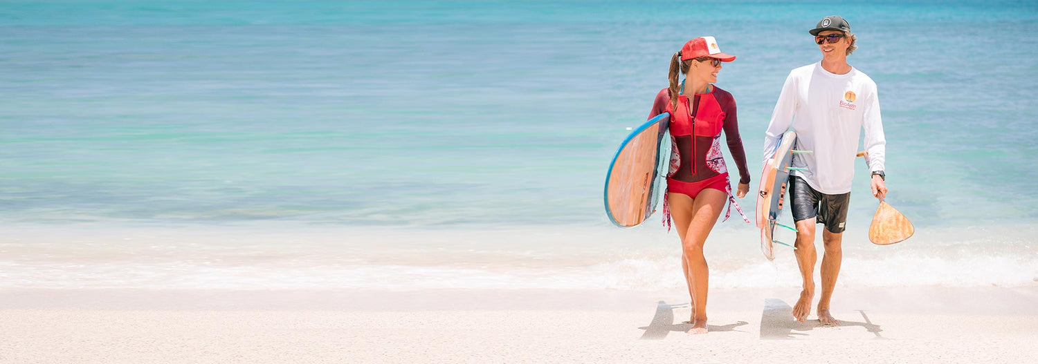 two stand up paddle boarders  