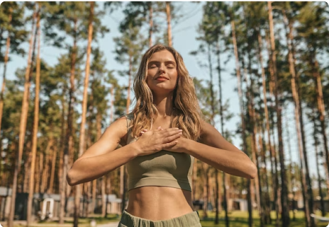 woman with eyes closed in nature